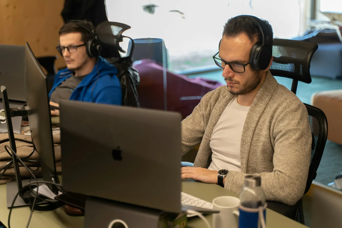 An IT team at their desks